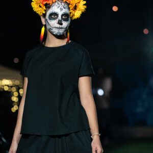 Person wearing Day of the Dead makeup.
